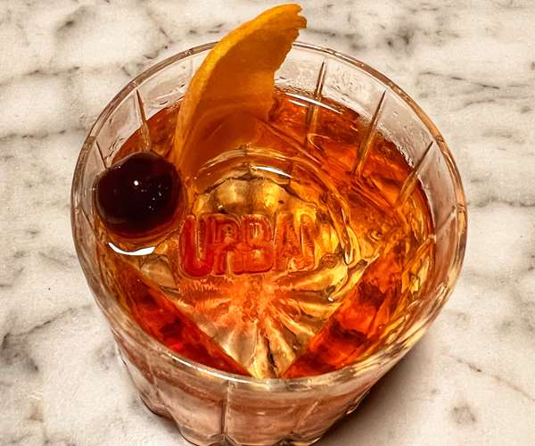 Old Fashion cocktail with custom Urban ice cube